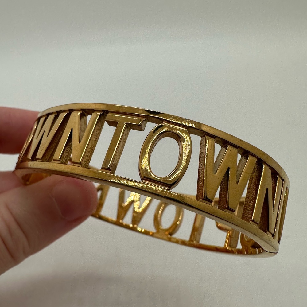 Rebecca Minkoff gold tone magnetic hinge ‘Downtown, Uptown’ bangle bracelet